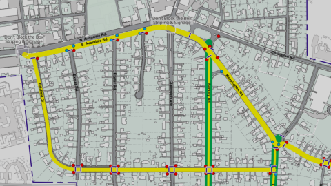 A grid of city streets shown with lines atop them and new traffic-calming measures in a small city near Atlanta.