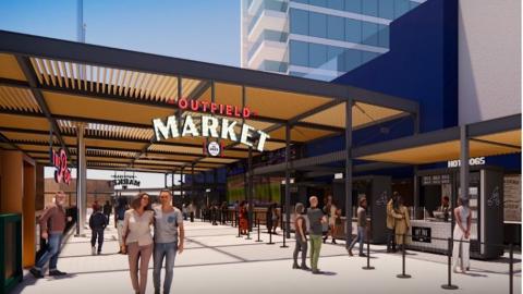 A food hall and walkway is shown outside the Atlanta Braves stadium under blue skies outside Atlanta.