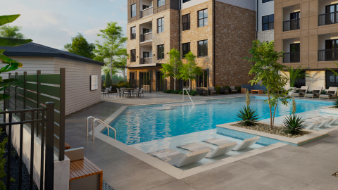 A large development with brick and side and a pool area with small trees planned for a cleared site near an interstate north of Atlanta.