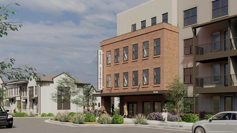A rendering of a new development with a large building and smaller white townhomes under blue skies in Atlanta.