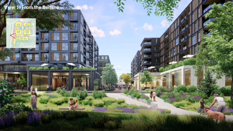 A courtyard of a large housing development planned in Midtown Atlanta with a giant ceiling fan overhead.