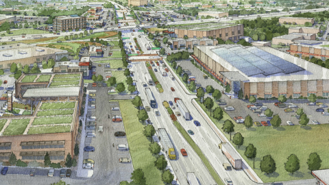 A rendering of a large highway outside Atlanta with many buildings and open lots beside it.
