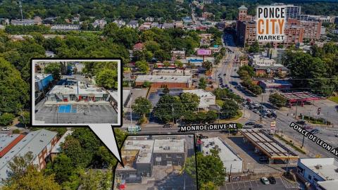 An overview of a large new development site east of Midtown Atlanta near many wide roads and other buildings.