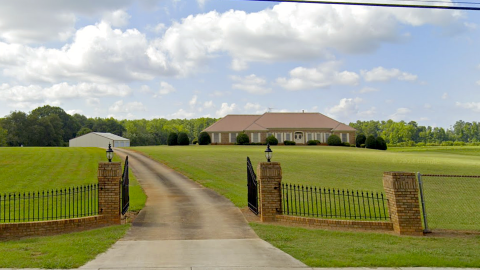An overview of a large open property north of Atlanta near many houses where a 50-acre new park is planned soon.