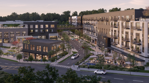 A large mixed-use development shown under event skies north of Atlanta near wide roads, with many shops at the center.