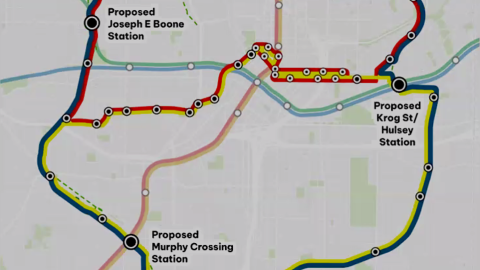 An image of a large transit system on a route with many colors and stations bending round Midtown and downtown Atlanta, with many words overlaid.