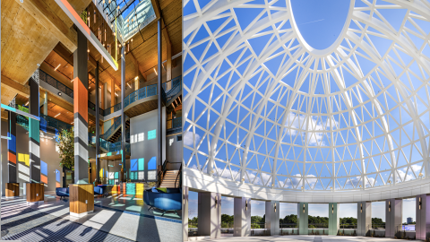 A large new city hall building with many offices and government quarters topped with a large white dome structure just north of Atlanta in Brookhaven, under blue skies.  