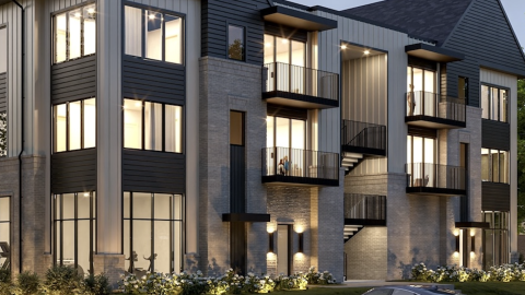 A rendering of a large three-story modern building with big windows and amenities visible from the street, under gray blue skies. 