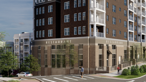 An image of a large development site under blue skies near wide streets south of downtown Atlanta and the Beltline trail. 