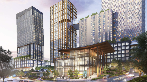 A rendering showing a large new development with many buildings and greenspaces and glassy area along two streets in Midtown Atlanta.