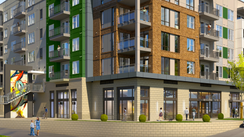 An image showing a large new apartment and retail complex off a wide road in Cobb County, northwest of Atlanta. 