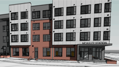 A rendering showing a four-story apartment building under gray-blue skies near two wide streets in downtown Atlanta.