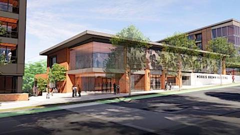 An image of a site where large buildings are planned under blue skies near two large stadiums and wide roads in Atlanta.