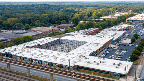 An overview of a large warehouse space where a new college campus is planned in West End Atlanta. 