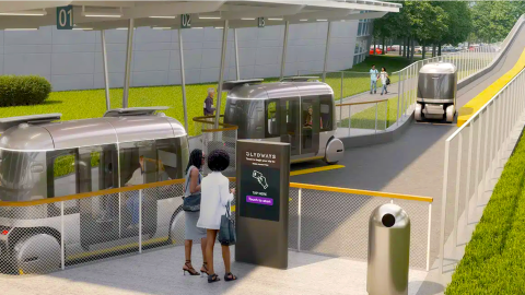 An image of a new transportation system with autonomous pods near Atlanta's airport with people milling about and trees in the distance.