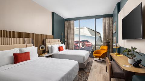 An image of a new upscale hotel in downtown Atlanta new huge stadiums and other tall buildings. 