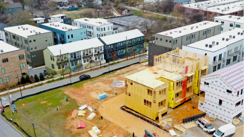 An image of a huge development site across several blocks in an Atlanta neighborhood near new streets and trees.