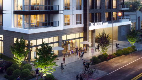 An image of a large modern new hotel on a wide downtown street in Decatur, Georgia, east of Atlanta.