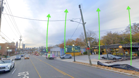An image showing a large development site on Atlanta's eastside along a wide street and blue cloudy skies. 