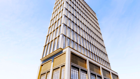 A rendering of a beige and glass apartment tower planned for a corner site in downtown Atlanta. 