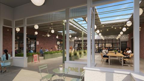 A rendering of a large new courtyard retail area in Atlanta with many older storefronts and new eateries and shops. 