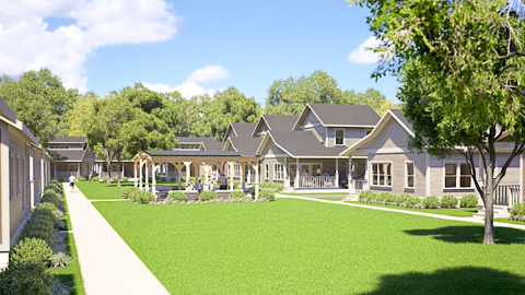 A rendering of a large village of standalone homes under blue skies with a large green courtyard in the middle and porch, with people on bikes and a shopping center nearby. 