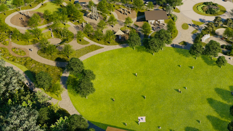 A visual from above of a renovated new greenspace in Atlanta near a wide parking lot and a winding pretty river.
