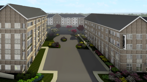 An image of a large site where rows of apartments three or four stories are planned northeast of Atlanta under blue gray skies. 