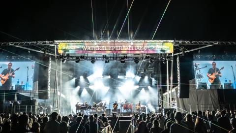 A photo of a large concert gathering with big crowds at Atlanta's largest park. 
