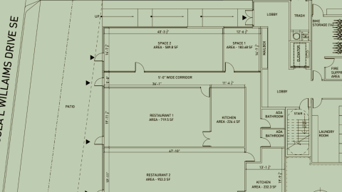 a site plan for a large new building along a wide street in Atlanta in a business district on the eastside. 