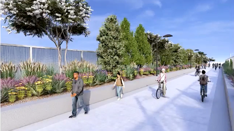 An image of a large Beltline trail and pathway project on Atlanta's eastside with many new plantings and new concrete beside wide roads.
