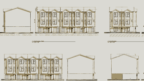 An image of a townhome site where 14 units are being built west of Midtown Atlanta near many trees.