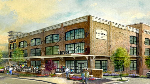 An image showing a large new boutique hotel in Lawrenceville suburb northeast of Atlanta, near a charming downtown square.