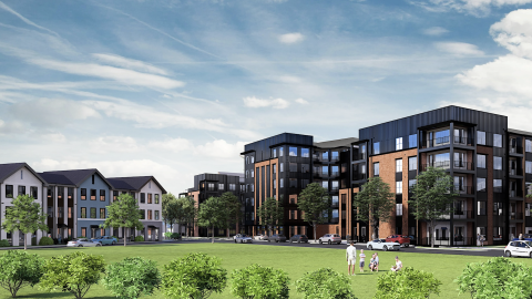 An image of a large new mixed-use district underway in Southwest Atlanta under blue skies near trees and junkyards, a block or so from the Beltline.