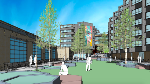 A rendering of a large new residential project in Atlanta under blue skies with a courtyard in the middle. 