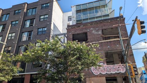 An image of a large corner development just east of downtown Atlanta on wide streets in the Sweet Auburn neighborhood.