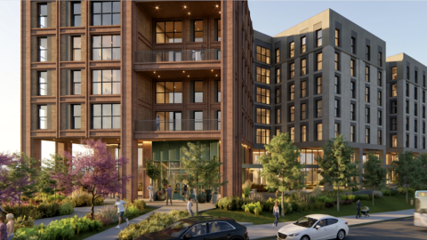A large new development site in Athens, GA under blue gray skies where hundreds of student apartments and retail is planned.