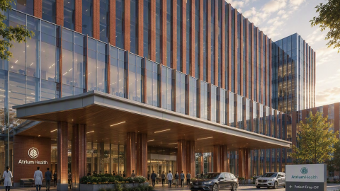 An image of plans for a large hospital complex in Southwest Atlanta with large glass walls and a big lobby and roundabout.