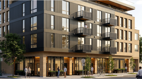 A five-story new apartment complex planned along a wide street with many apartments in Atlanta under gray-blue skies, with many balconies. 