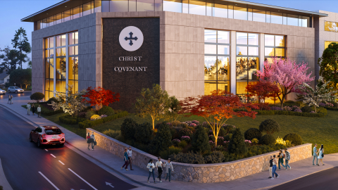 An image of a site with a date 1980s office building where a church is planned to be built in coming years along a wide road in Buckhead Atlanta.