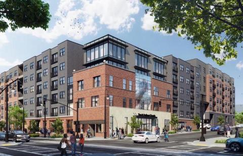 A photo of a corner in Atlanta with a large empty building on it where a large development is planned.