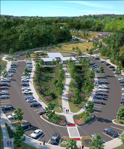 An image of a large greenspace beside a river where a new park is planned.