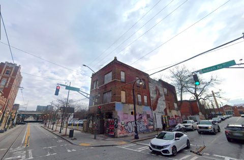 A corner in atlanta with an abandoned building where a large mixed-use building is planned.