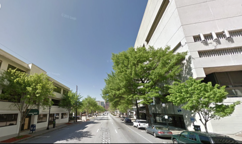  a photo of Midtown Atlanta with many buildings showing how wide streets and perspectives on how many parking lots, vacant parcels have disappeared