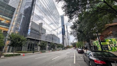 a photo of Midtown Atlanta with many buildings showing how wide streets and perspectives on how many parking lots, vacant parcels have disappeared
