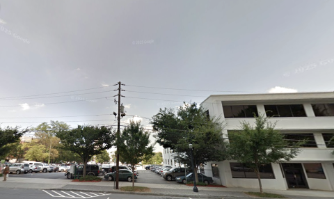  a photo of Midtown Atlanta with many buildings showing how wide streets and perspectives on how many parking lots, vacant parcels have disappeared