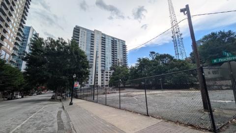 a photo of Midtown Atlanta with many buildings showing how wide streets and perspectives on how many parking lots, vacant parcels have disappeared