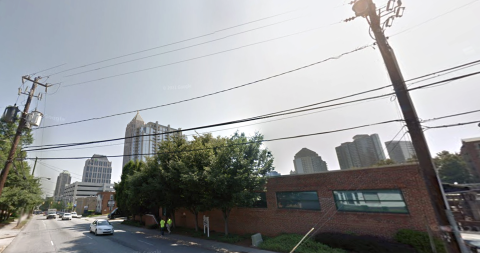  a photo of Midtown Atlanta with many buildings showing how wide streets and perspectives on how many parking lots, vacant parcels have disappeared