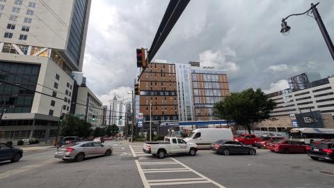  a photo of Midtown Atlanta with many buildings showing how wide streets and perspectives on how many parking lots, vacant parcels have disappeared