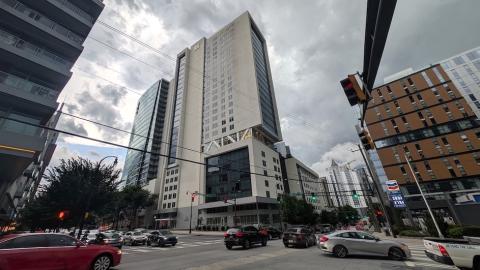  a photo of Midtown Atlanta with many buildings showing how wide streets and perspectives on how many parking lots, vacant parcels have disappeared